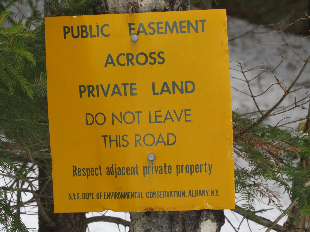 Sign along Round Pond Road Trail