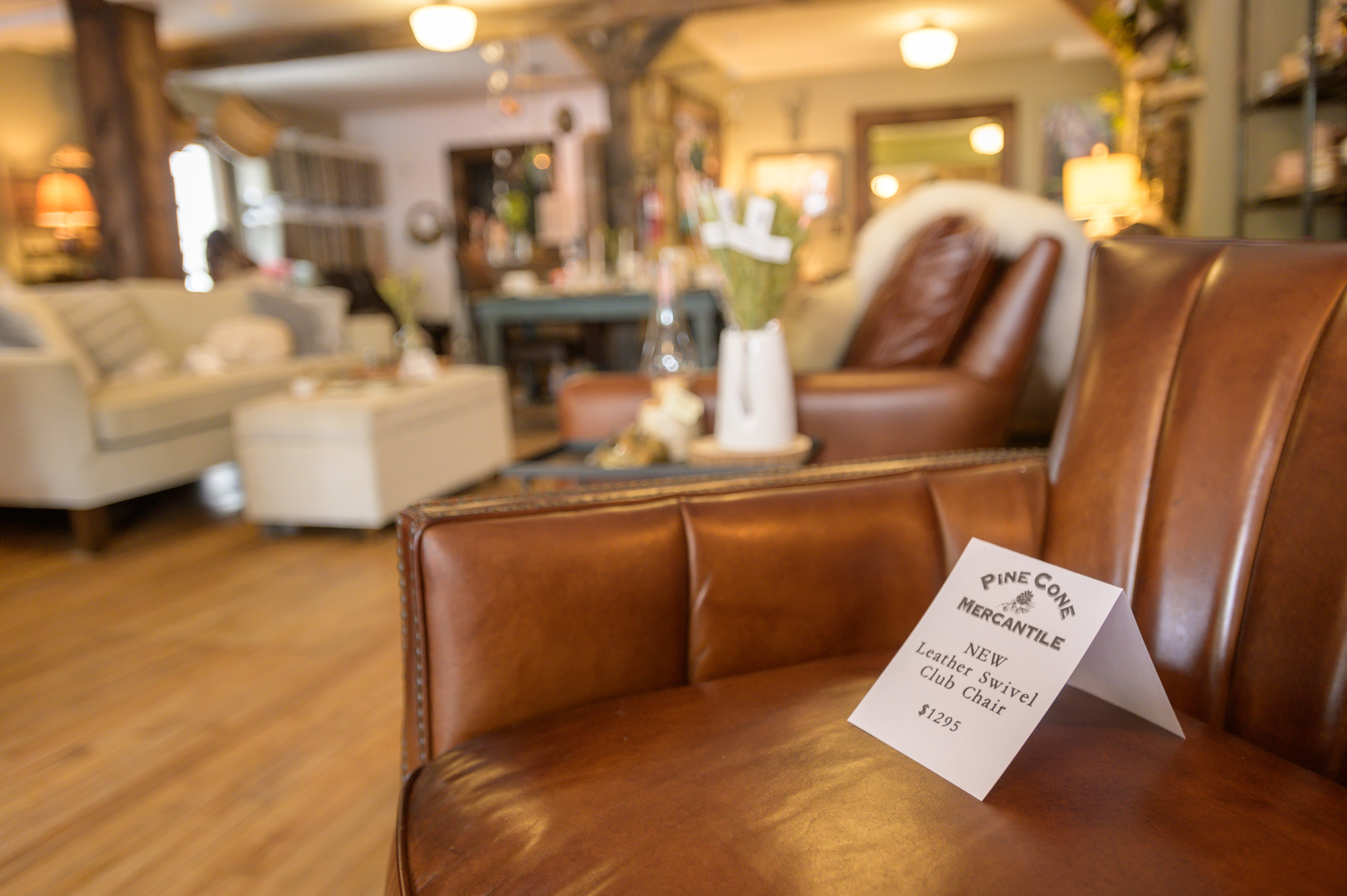A chair with a price tag on the seat.