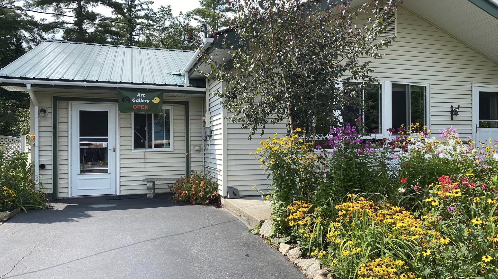 A view of the front entrance and gardens of the Judy Nelson Art Gallery