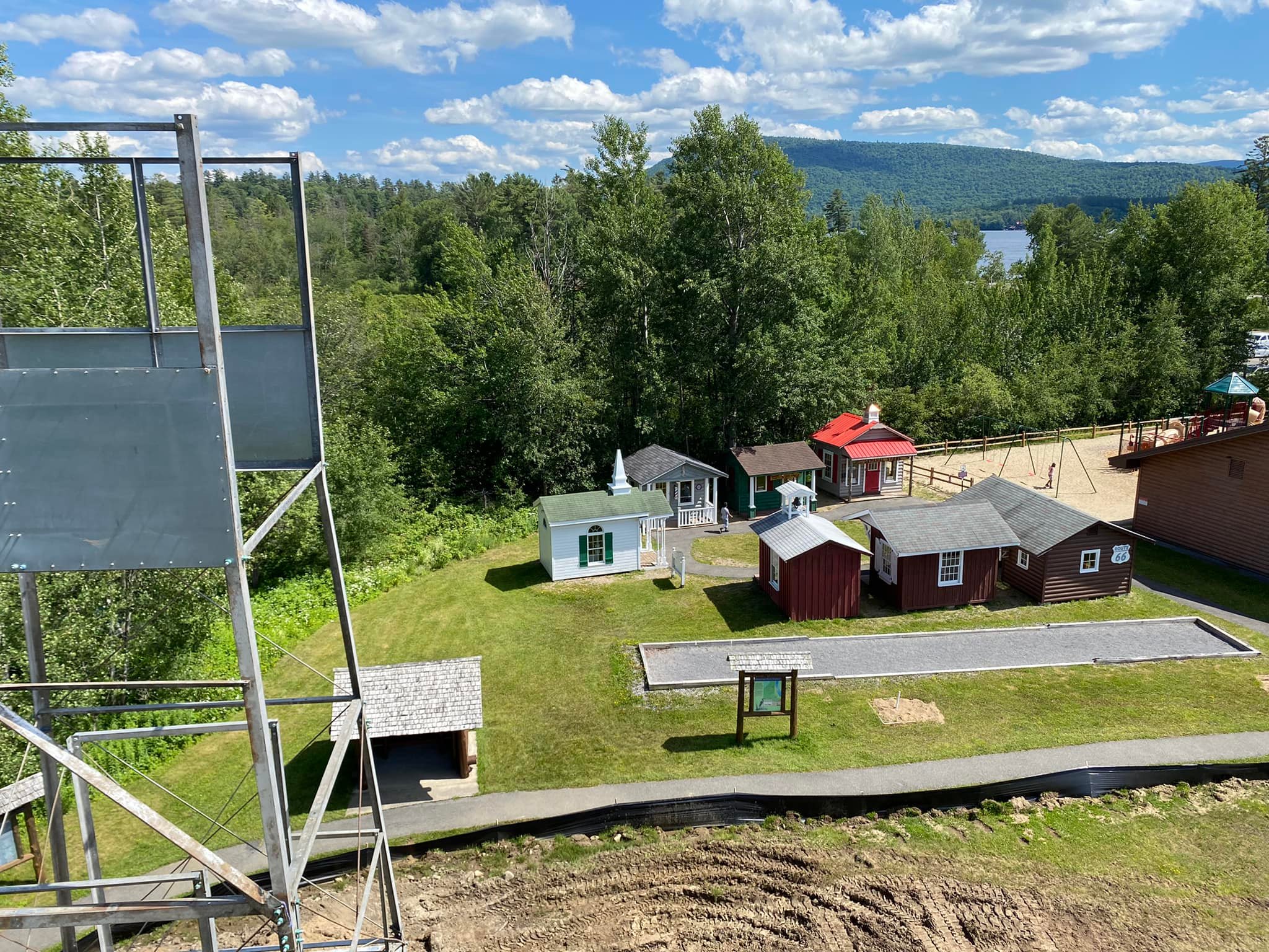 An aerial view of the tower mid-construction with Route 66 below.