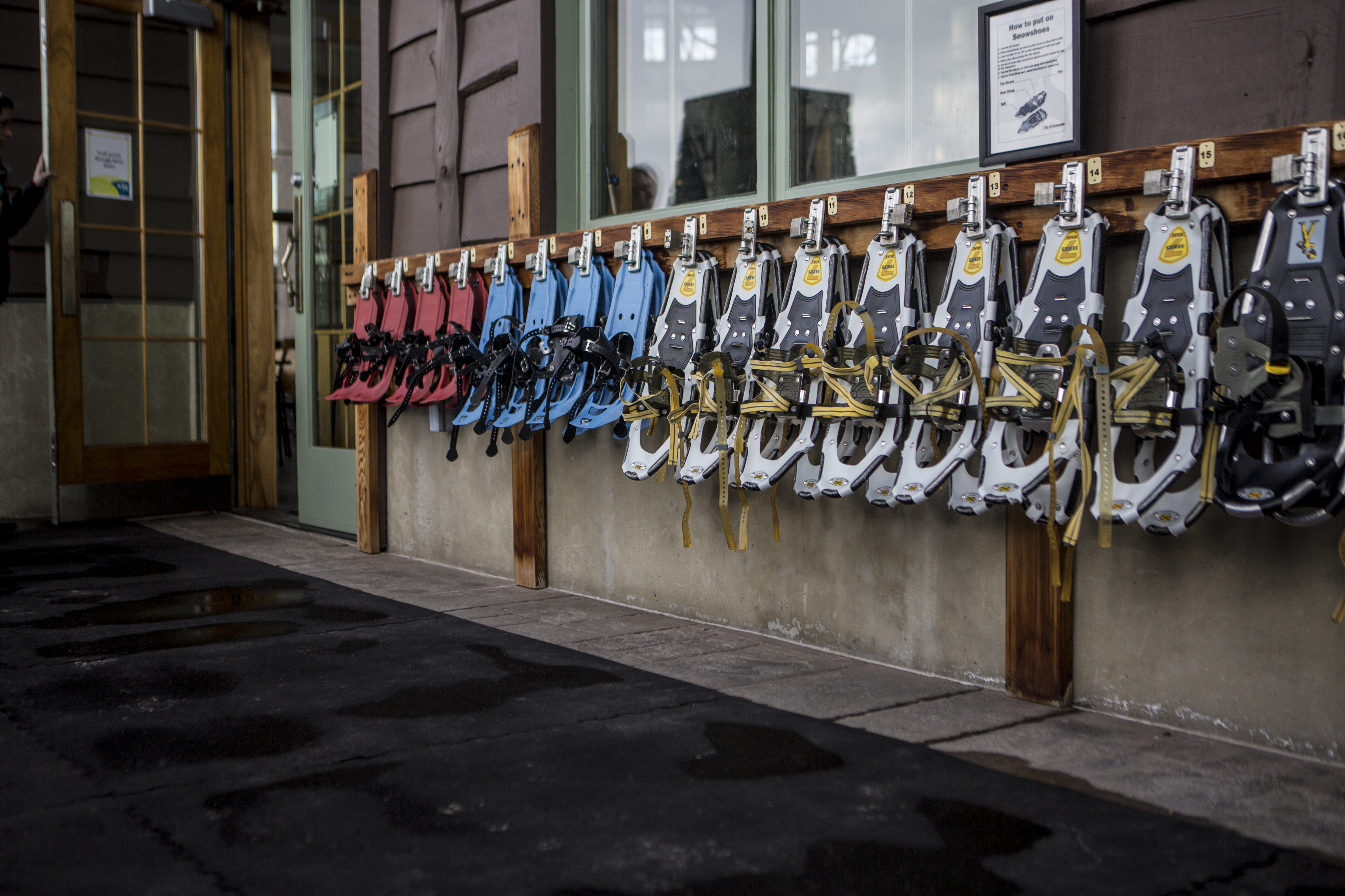 The wall of snowshoes available to use at The Wild Center.