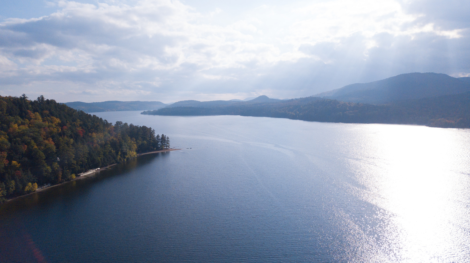 An aerial shot of Schroon Lake during fall