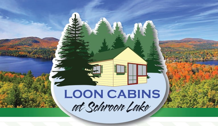 A logo with a white cabin amidst trees with the title: "Loon Cabins."