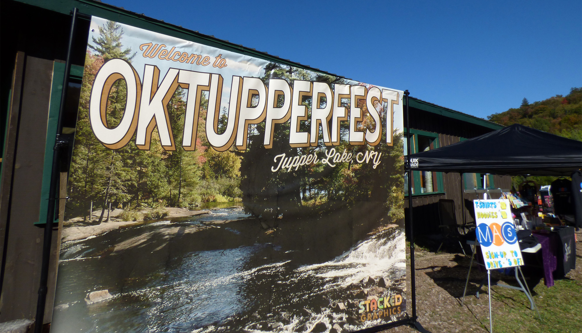 A postcard-style banner advertises OkTUPPERfest on a sunny day.