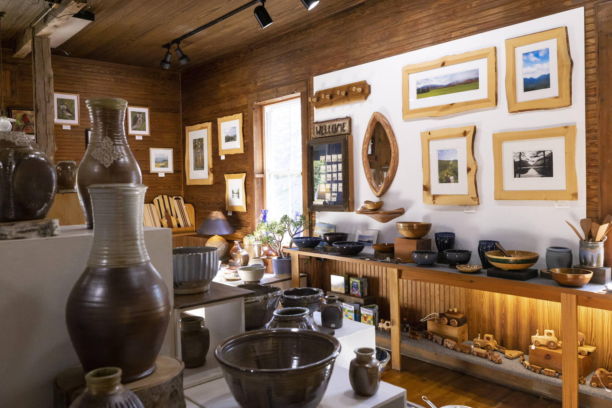 A warm nook of handmade goodies in a shop.