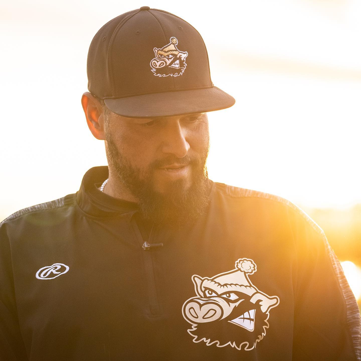 A River Pigs team member with the setting sun behind him.
