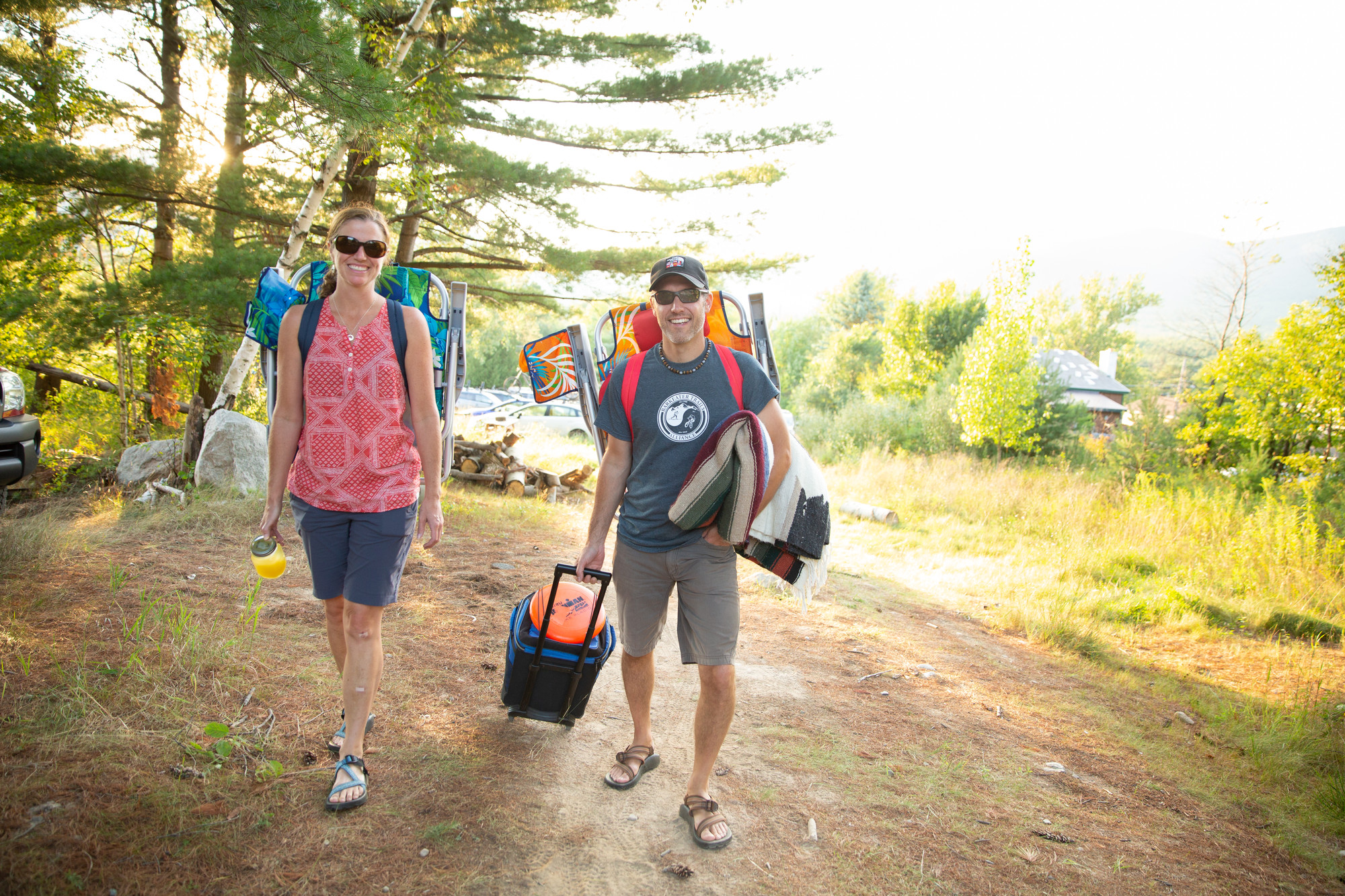 Some people walking to the beach