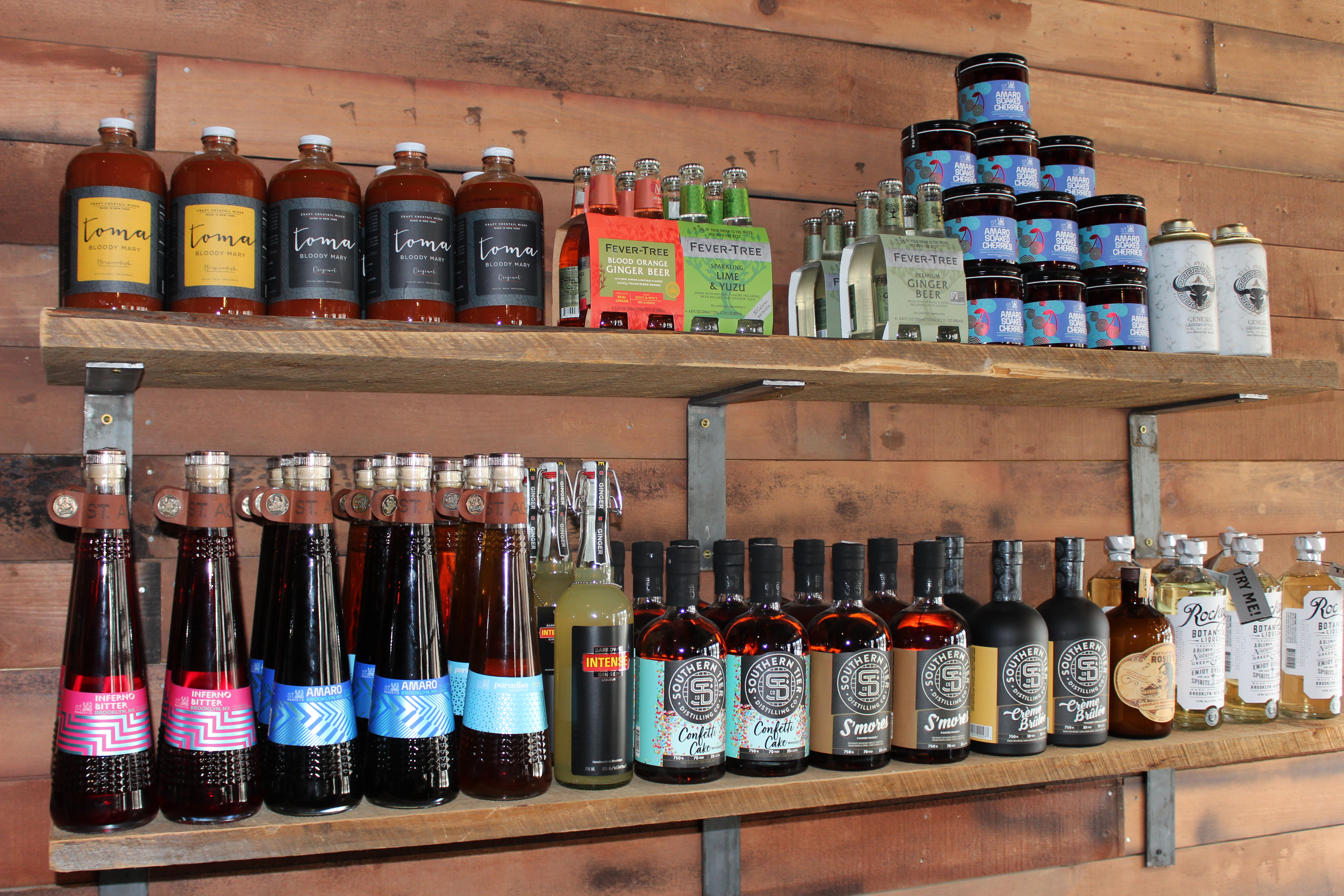 An assortment of alcoholic beverages on shelves