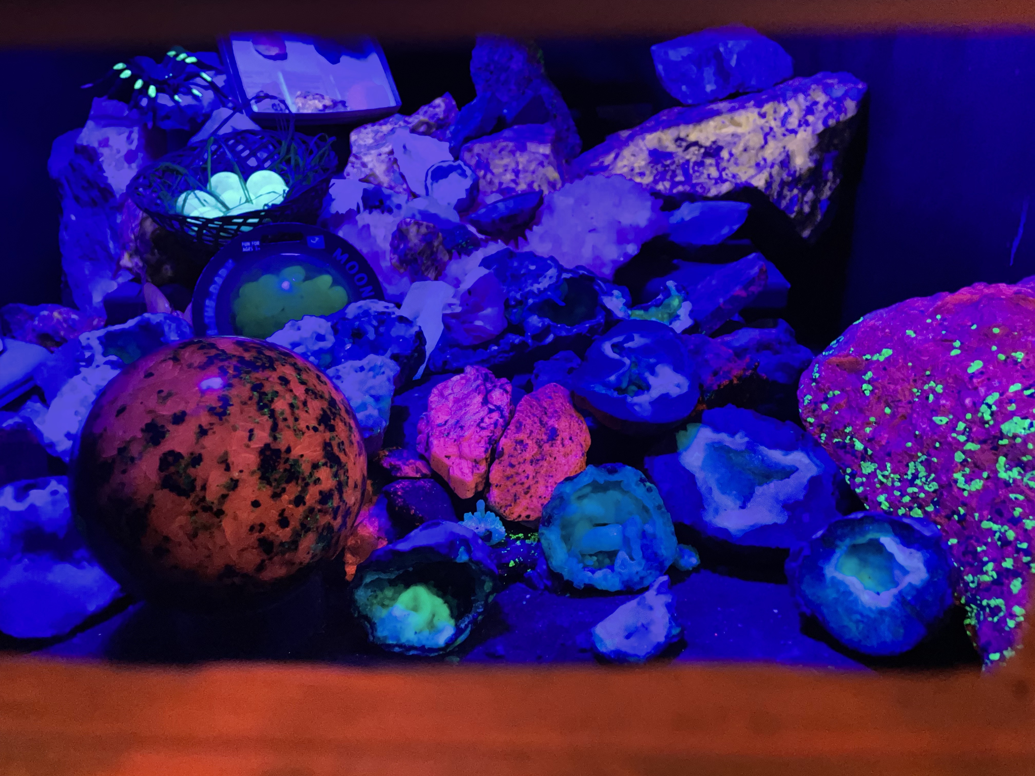 Minerals fluoresce under UV light.