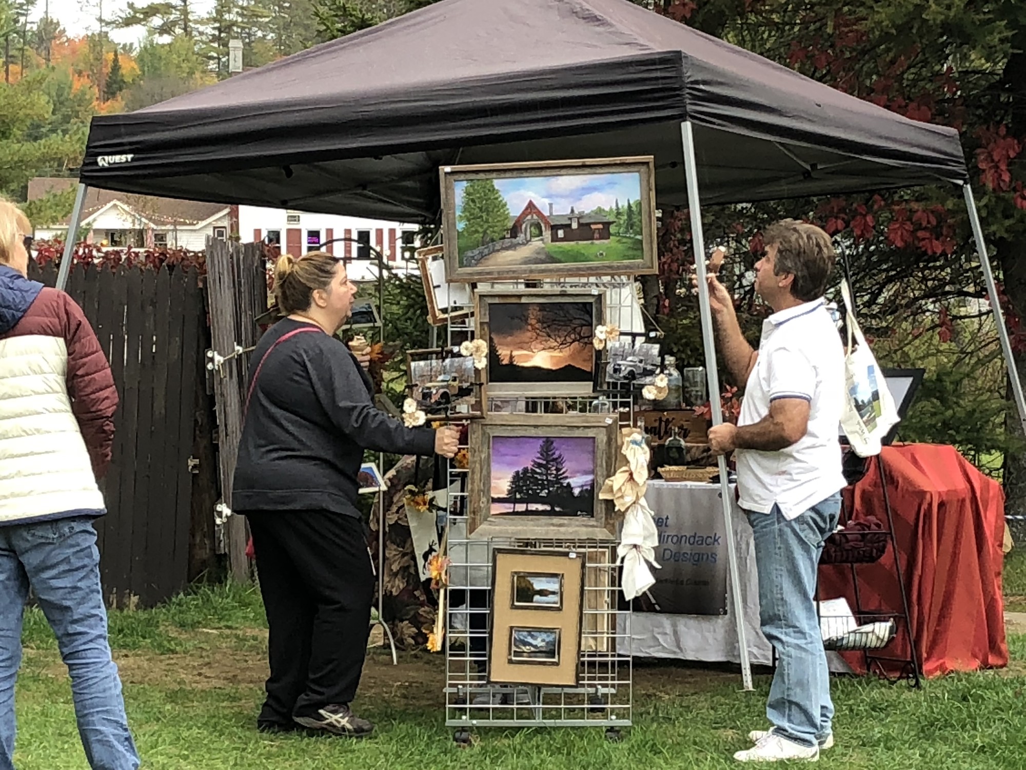 Vendor tents set up in Long Lake at the Harvest Craft Fair